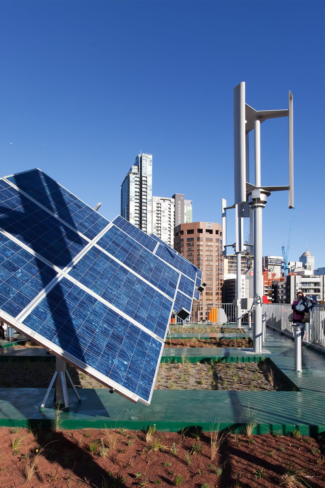 Pixel Building green roof with PV panels and wind turbines.